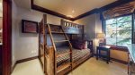 Fourth bedroom features queen and twin bunk, hallway bathroom and living room